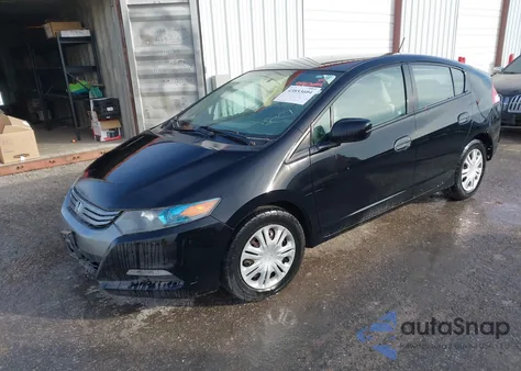 2011 Honda Insight from USA, damaged, VIN JHMZE2H36BS000609